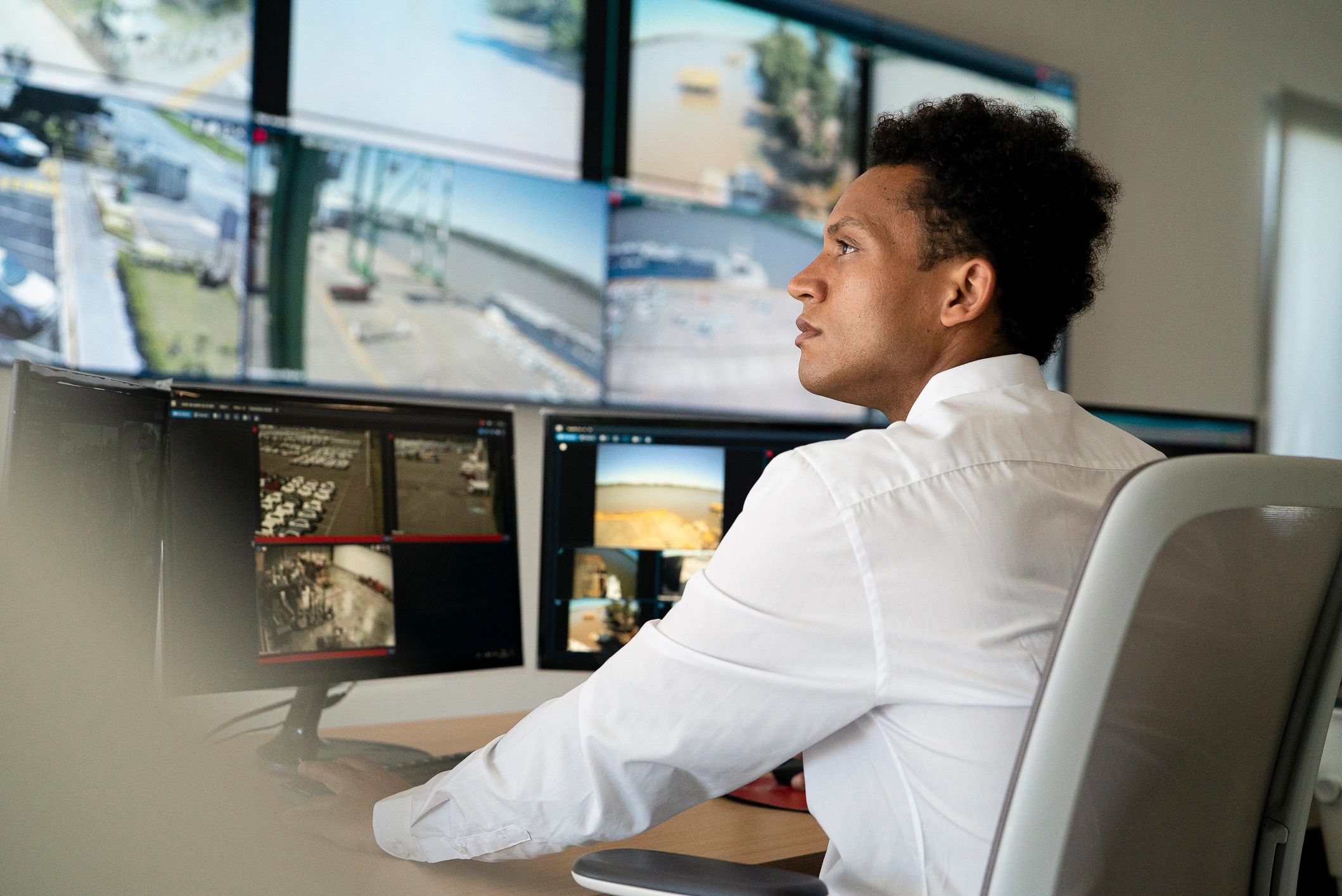Operations control room professional monitoring fleet data
